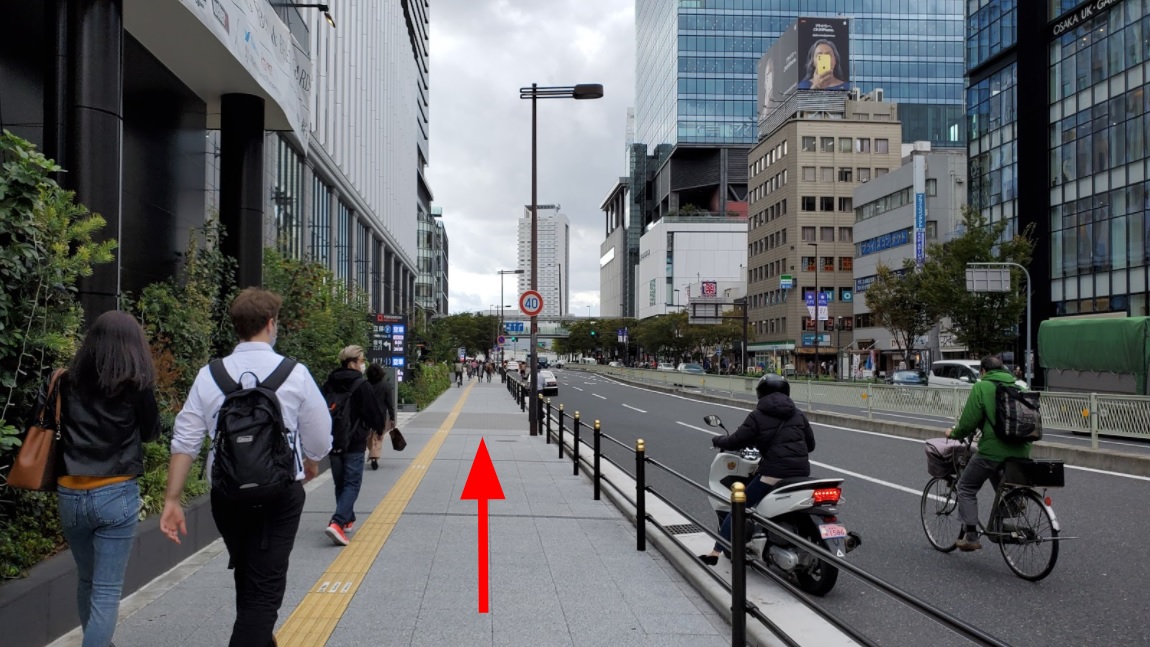 Go straight about 240m along Yodobashi Camera Umeda - Grand Front Osaka.(There is a pedestrian on the way.)